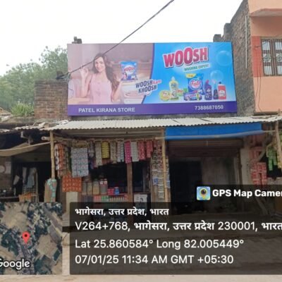 "A rectangular billboard mounted on a brick wall, featuring a colorful advertisement for non lit board non - lit board