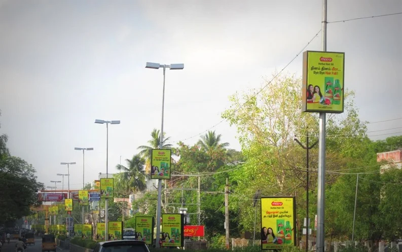 Pole kiosk branding is a high-visibility OOH advertising format using eye-level ads on poles to attract local audiences effectively.