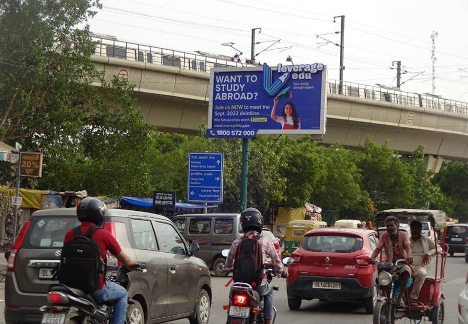 Large outdoor Unipole by Acme Advertiser displayed on a busy roadside, showcasing high-impact hoarding advertising for brand visibility in urban India.Top Digital Billboard Advertising Companies in Delhi
