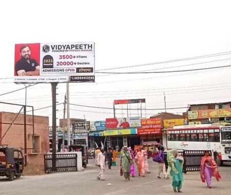 ACME Advertising Co.'s premium unipole display in a high-traffic urban location