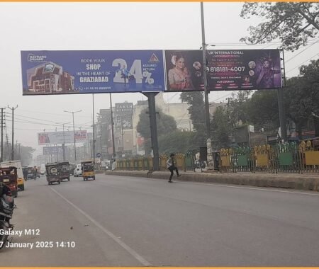 High-visibility outdoor gantry installed by ACME Advertising Co. for impactful highway branding