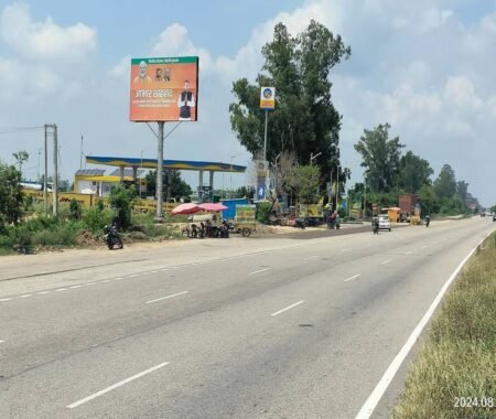 ACME Advertising Co.'s premium unipole display in a high-traffic urban location