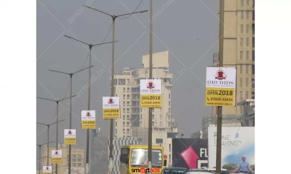 Pole kiosk advertising banners on street poles in Haryana for local brand promotion