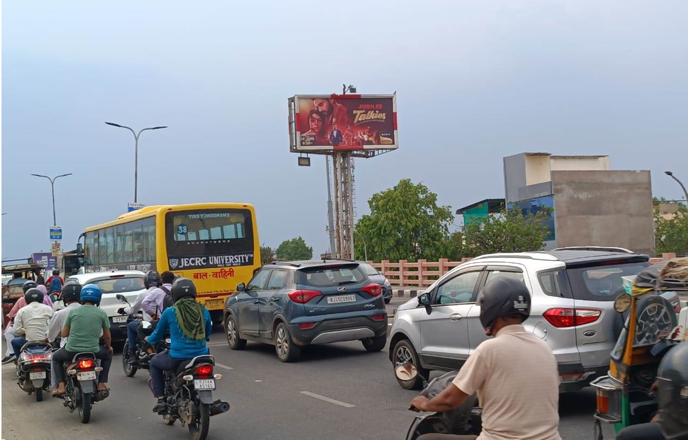 Highway Hoarding Advertising Companies in Rajasthan showcasing a large outdoor billboard promoting a brand along a busy national highway.