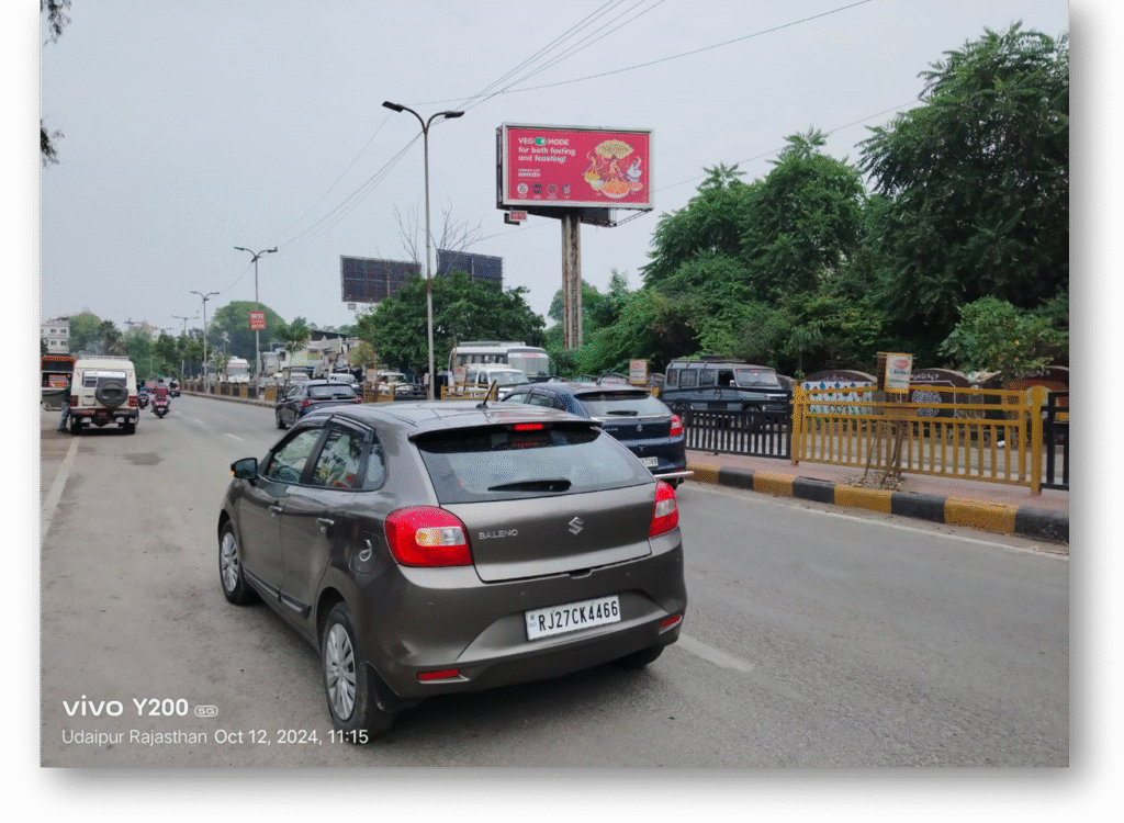 Outdoor advertising display by Acme Advertising Co. featuring high-visibility branding on busy street location