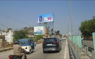 ₹99 Hindi Billboard Campaign | Billboard Advertising Companies in Lucknow | ACME Advertising Co. Roadside billboard in Lucknow displaying a ₹99 Hindi ad, placed by ACME Advertising Co., a leading name among billboard advertising companies in Lucknow.