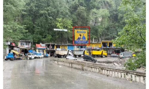 Belanto spices billboard in hilly roadside market—ACME Advertising Co., top unipole adevrtising companies in Jammu and Kashmir, drives regional brand visibility.