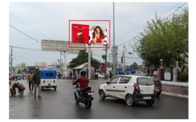 Coca-Cola hoarding above busy street ACME Advertising Co., a top hoarding advertising companies in Jammu and Kashmir, delivers festive urban branding.