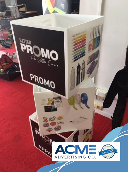 Cube box advertising display for branding and promotions by Acme Advertising Co.