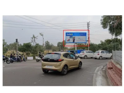 GetNaji travel billboard at urban junction, ACME Advertising Co., top billboard companies in Jammu & Kashmir, promotes leisure and business travel.