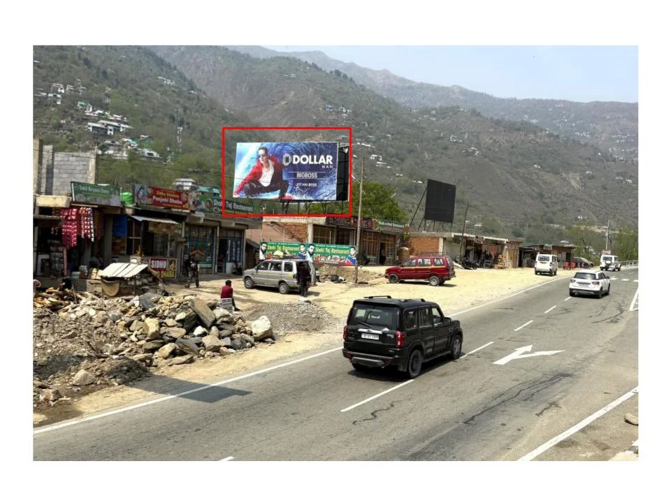 DOLLAR apparel billboard in hilly roadside scene ACME Advertising Co., top billboard advertising companies in Jammu & Kashmir, promotes comfort branding.