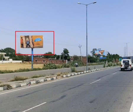 Bhawanigarh Flyover facing Sangrur with 20x10 ft hoarding by ACME Advertising Co., featuring two person ad, visible SUV, streetlights, and secondary billboard