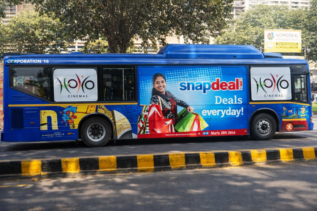 Snapdeal retail brand visibility enhanced through colorful bus wrap using Bus Branding Services