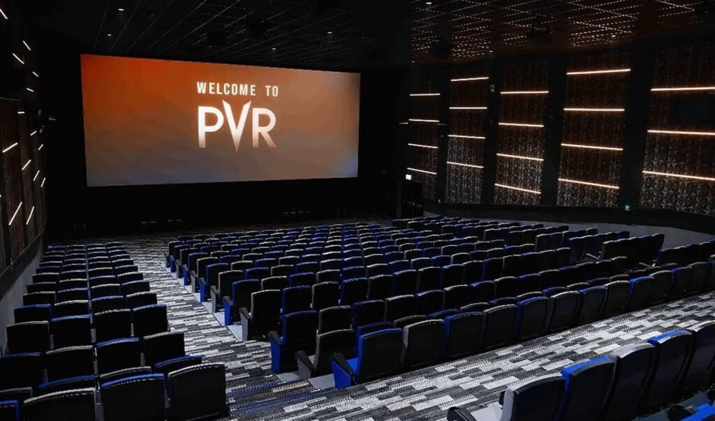 Cinema advertising displayed in a premium multiplex auditorium with branded visuals before movie start
