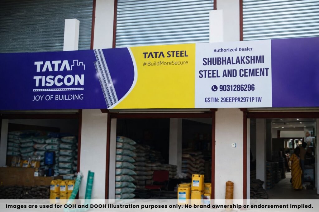 Dealer Board Advertisement of Tata Tiscon steel authorized dealer showcasing branding and contact details