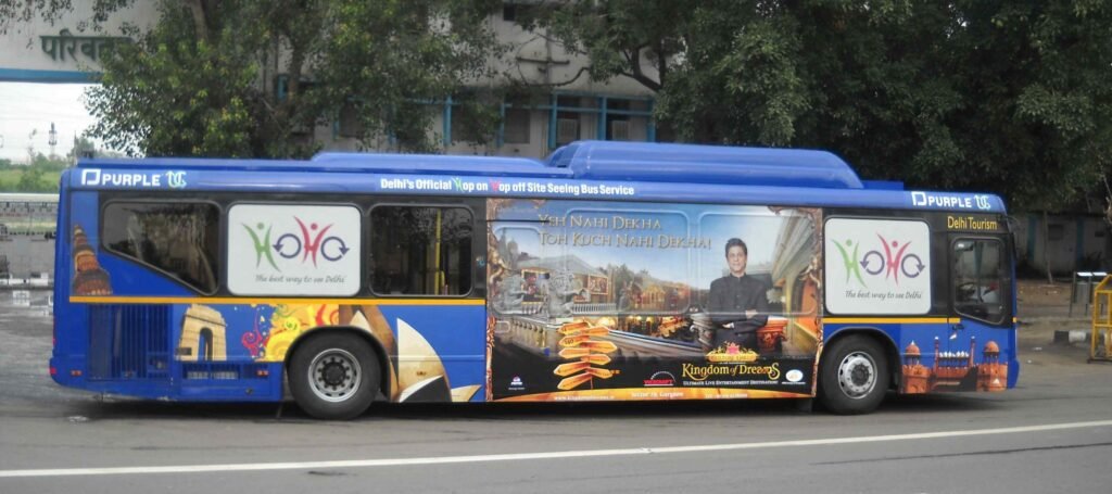 Delhi Tourism HOHO sightseeing bus wrapped with tourism creatives using Bus Branding Services