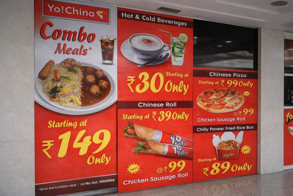 Indoor restaurant wall branding featuring food visuals, pricing, and combo meal promotions