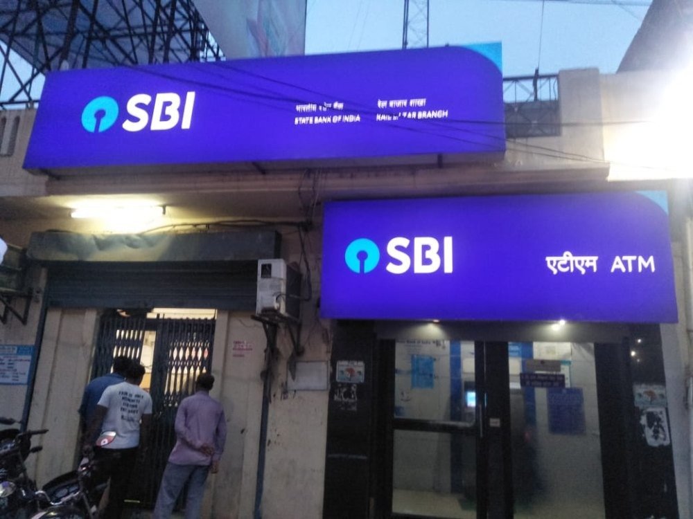 Glow Sign Board Advertising showcasing SBI bank illuminated signage for strong nighttime brand visibility