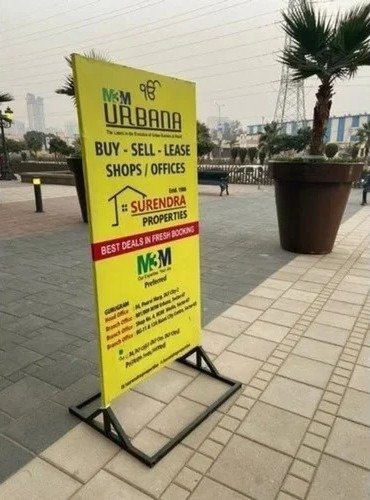 Flex Board Advertising for real estate buy sell lease services placed in a high-visibility public walkway
