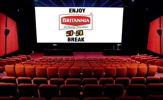 Cinema advertising by a food and snack brand shown on a large movie screen inside a packed theatre