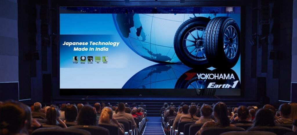 High-definition cinema advertising shown on a digital movie screen inside a modern cinema hall