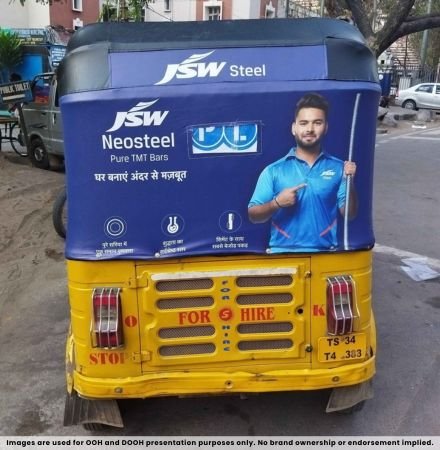 Auto branding advertising campaign promoting steel brand on moving vehicle